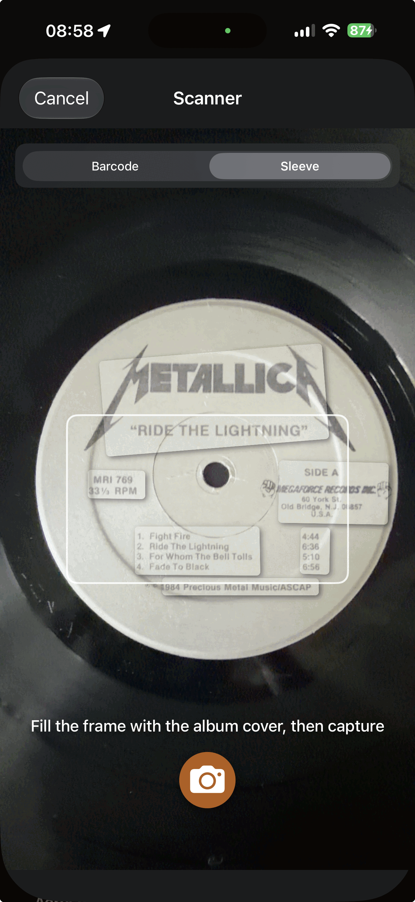 VinylCrate's Sleeve Scan camera screen, the Barcode/Sleeve toggle set to Sleeve, framing the center label of a Metallica 'Ride the Lightning' record — catalog number MRI 769, Megaforce Records, Side A tracklist visible — under the prompt 'Fill the frame with the album cover, then capture'