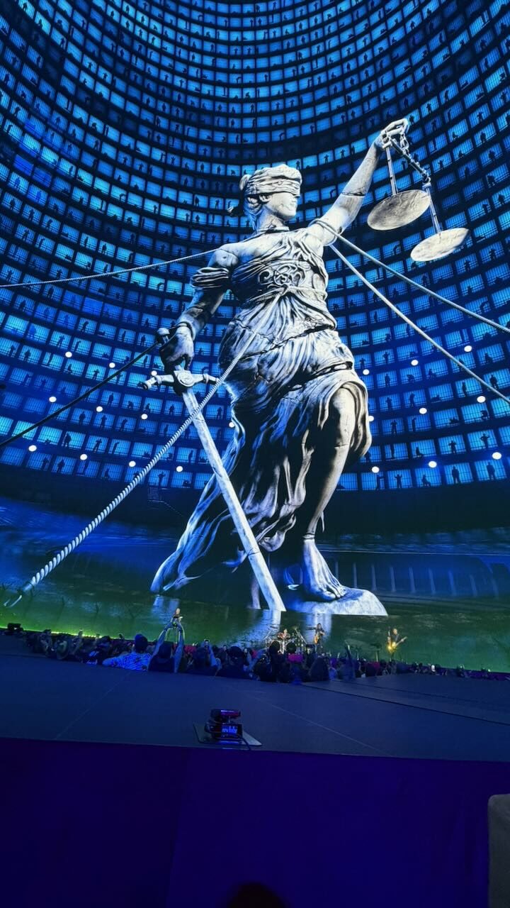 A Lady Justice statue shown on the Sphere screen during ...And Justice for All